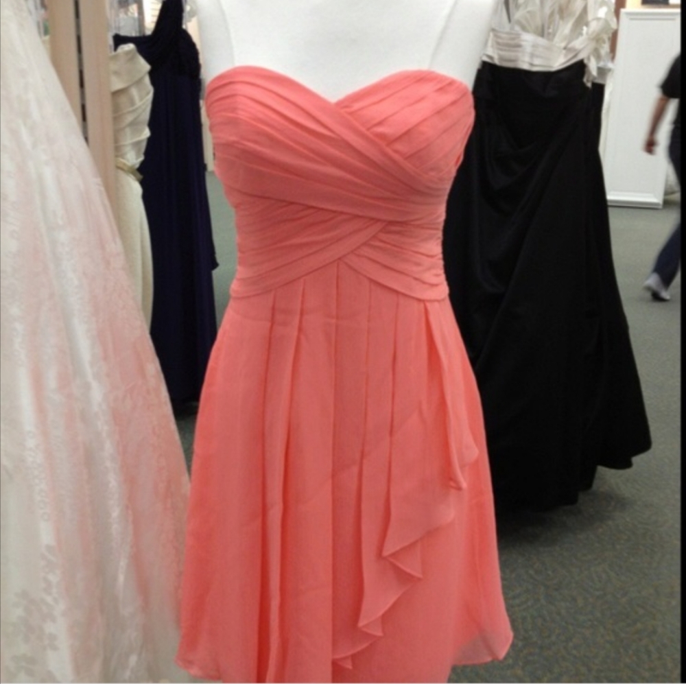Beautiful bridesmaids dress from David's Bridal, in the color Coral Reef. Size 2